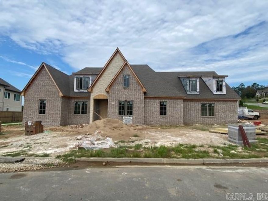 One of the rare level lots in sought-after Falstone, complete with stunning views! This brand-new custom brick and stone residence by Hartness Construction offers the perfect blend of luxury and livability with exceptional high-end finishes throughout. The main level boasts an inviting great room with fireplace, formal dining room, and a custom-designed kitchen with walk-in prep-kitchen & pantry. A private study provides the ideal space for working from home. The spacious owner’s suite features a spa-like bath, joined by two additional bedroom suites on the same floor for ultimate convenience. Upstairs, you’ll find a versatile playroom or media room and another full bedroom suite—perfect for guests or family. Enjoy outdoor living at its finest with a 658 sq. ft. covered porch, with fireplace, overlooking the flat backyard and sweeping views. A three-car side-loading garage completes this extraordinary property.
