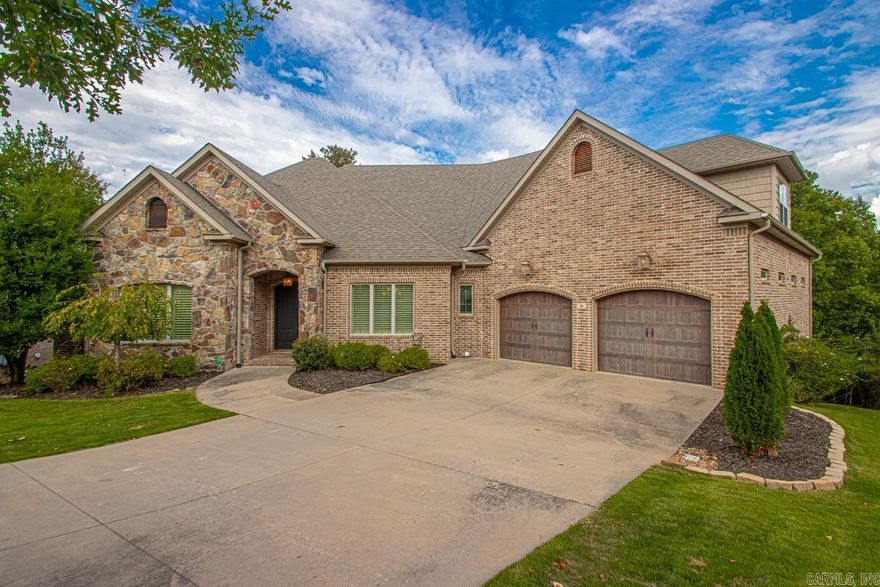Beautiful home situated on a private lot and cul-de-sac!  The home boasts 4BR, 4BA & a 1/2 BA: Primary and 2 other bedrooms, all with private bath, on main level and large upstairs bonus room w additional bedroom and bath!  Office on main level.  Green space behind allows privacy and a peaceful view from back decks and lower patio with firepit.  Conveyed Hot tub, 1 year old on lower-level deck, is nestled into a cozy private area you will love!  Storm shelter and gym or golf simulator area are good options for the completely encapsulated crawlspace with access from inside the home.  Buried invisible dog fence conveys, buyer would only need to purchase collar with sensor for dog.   New carpet and pad Oct 2025, paint inside and front door Oct 2025.  3 car tandem garage.  This one is a must see!