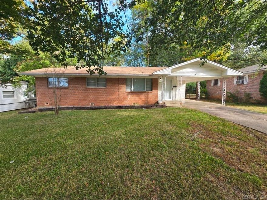 Discover comfort and style in this beautifully updated 3-bedroom, 2-bath single-story brick home, designed for easy living and low-maintenance upkeep. From its wood vinyl plank flooring to the calming rich blue walls, every detail adds a touch of warmth and personality. Step into a spacious formal living room that flows effortlessly into the dining area, creating an open and inviting layout perfect for everyday living or entertaining. The U-shaped kitchen offers ample cabinet storage and generous countertop space, making meal prep a breeze. Both bathrooms are thoughtfully designed one features a bathtub with showerhead combo, and the other offers a sleek walk-in shower setup, ideal for flexibility and comfort. The home also includes a dedicated laundry area with extra cabinet storage to keep things organized. Outside, enjoy a fully fenced backyard with a deck area, perfect for relaxing or hosting friends. A side driveway with carport provides convenient off-street parking. This home blends charm, function, and style all in a desirable single-level layout.