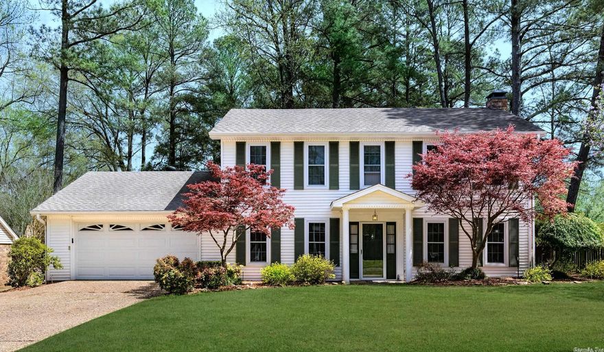 Super maintained and beautifully landscaped, level, corner lot, fire hydrant, gutters, keyless entry at garage, Simply Safe Security, sprinkler system, new double hinged windows, water heater and refrigerator new 2021, eat-in kitchen looks out on to rear deck, formal dining, huge den with gas log FP, centrally located 1/2 bath, extra storage at hallways & laundry, 2 exits to garage, bonus sun room not in SF, stone counter tops, blinds, fans & crown molding throughout, 4 beds - 2 baths up.