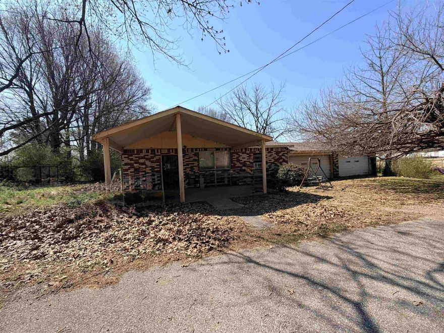 Unlock the possibilities with this 2-bedroom, 1-bath home full of potential! This property is a great opportunity for investors, flippers, or buyers looking to put their personal touch on a home.  Featuring a functional layout with a spacious living area, this home offers a solid foundation for renovation. The kitchen and bathroom are ready for updates, giving you the chance to design them to your taste. Both bedrooms offer good space and natural light, with room to reimagine and refresh.  Enjoy a large front porch—perfect for relaxing with your morning coffee or unwinding in the evening—adding charm and curb appeal to the home. Situated on an acre lot, the property provides plenty of outdoor space for improvements, expansion, or landscaping. With some TLC, this home could be transformed into a charming residence or a profitable investment.