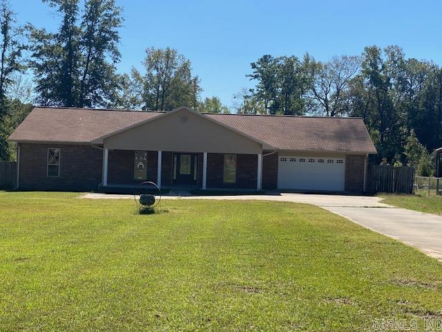 Brick, 3 bedroom 2 bath, completely renovated , MOVE-IN READY!! New paint, vinyl flooring, new lighting fixtures, new attic insulation, New septic system installed 2023, large open back porch, fenced across front for privacy sitting on 2 acres, all in White Hall School District. This Home is eligible for 100% Rural Development financing.