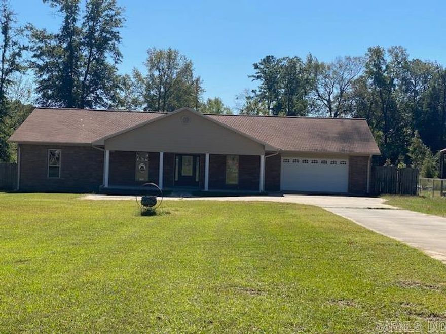 Brick, 3 bedroom 2 bath, completely renovated , MOVE-IN READY!! New paint, vinyl flooring, new lighting fixtures, new attic insulation, New septic system installed 2023,  large open back porch, fenced across front for privacy sitting on 2 acres, all in White Hall School District. This Home is eligible for 100% Rural Development financing.