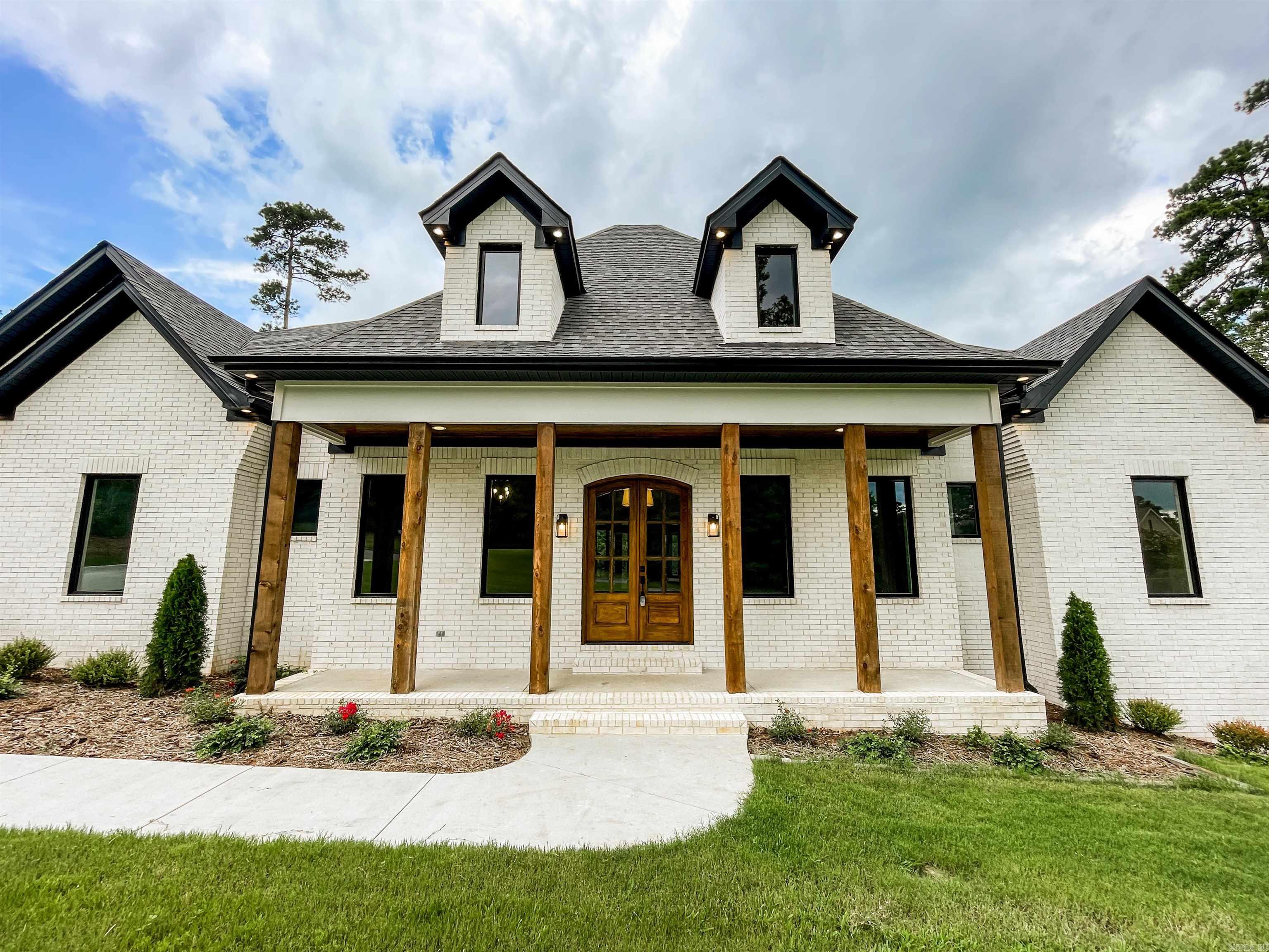 Once you pull through the incredible arched gatehouse of Waterview Estates you will find soon after all the neighborhood amenities such as the pickle ball courts, tennis court, two basketball courts, soccer/football area, community bonfire area, and miles of hand carved nature walking trials! The home backs up to a large green space area that offers a unique sense of privacy blocking any neighbors behind you. The lots also offers a sense of ample space with its 150' of road frontage. The home itself boast natural light with the tall ceilings and large windows. Every room designed to feel spacious, every bedroom to have its own walk in closet and private bathroom as well! All finishes that have not already been installed can be customized by the buyer unless already ordered! Large amount of unfinished space that can be finished out as well adding additional rooms to the home!