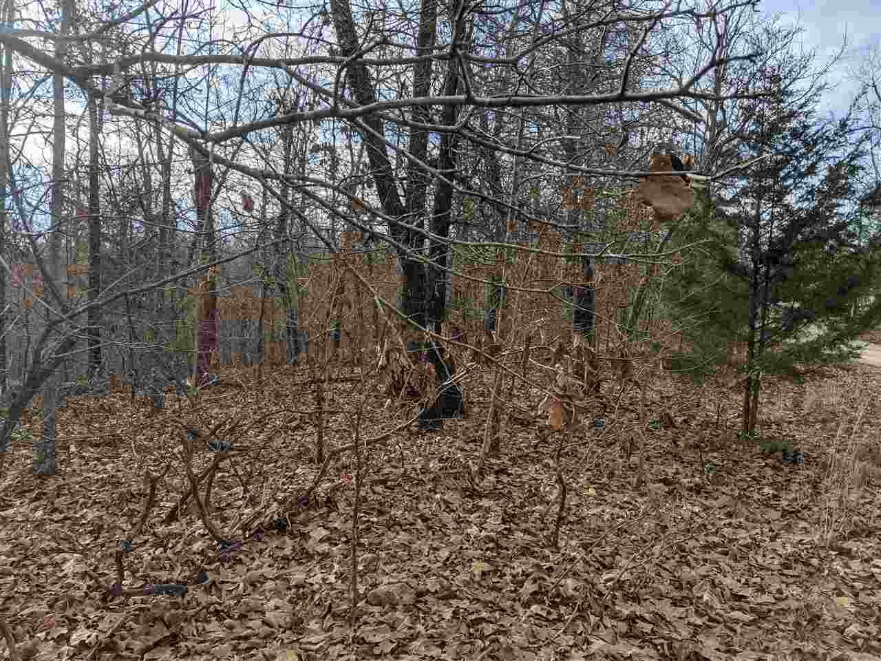 Four lots equaling 12 acres on Cherokee Acres Drive - a rare find in Cherokee Village! These wooded, unimproved lots are on the Fulton County side of Cherokee Village. City water and power at the road, septic permit and placing of tank would be required if plan to build. Potential mountain view!