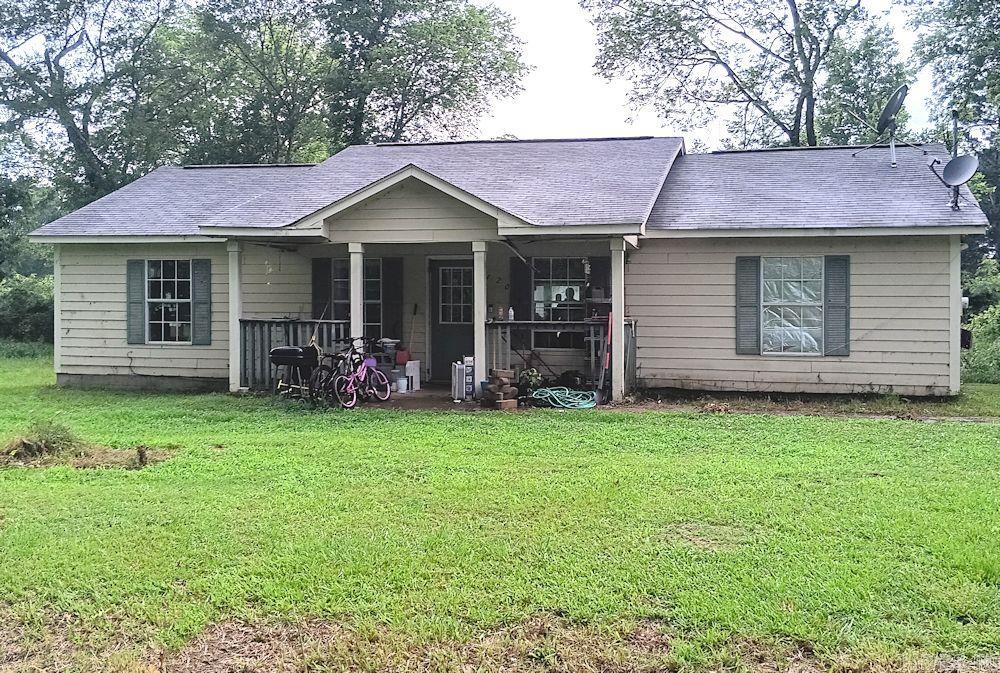 Three Bedroom two bath home on 4 level lots. Traditional floorplan with a kitchen/dining room combination. This home has 1300 square feet and is priced to sell. A new roof was installed three years ago. This home needs some touch up and minor repairs, but it has a lot of potential for the price. The location is convenient for shopping and dining as well as quick access to Interstate 30. Please call the listing agent for an appointment. The home is occupied so advance notice is requested.