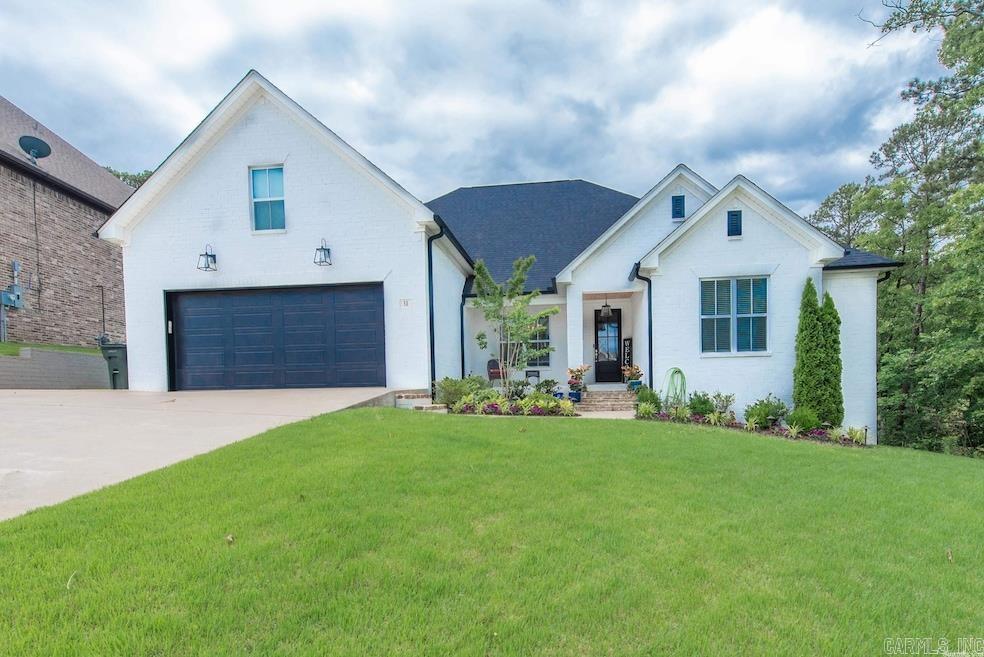 Look no further! Interest rates have dropped!! Nestled deep in the peaceful embrace of Chenal Valley woods, this stunning 2018 custom-built home blends modern comfort with timeless craftmanship. Top quality yet affordable new home in Chenal w/privacy in backyard. Inviting entry foyer, formal dining and kitchen-great room designed for entertaining. Master Suite w/fabulous bath & closet. 2 BR share J & J bath. Office or 4th bedroom on opposite side w/3rd full bath. Frigidaire Gallery stainless steel appliances. Pantry, breakfast bar & breakfast area. Lots of glass & natural light. Bonus room upstairs w/ walk-in closet & 4th full bath. Covered porch. Great value for 4BR,4B + Bonus room (with bathroom). 4 BR/3Bath down. Enclosed patio enjoying the quiet sounds of nature without the outdoor bugs. This is a must see! Showing this Sunday!!