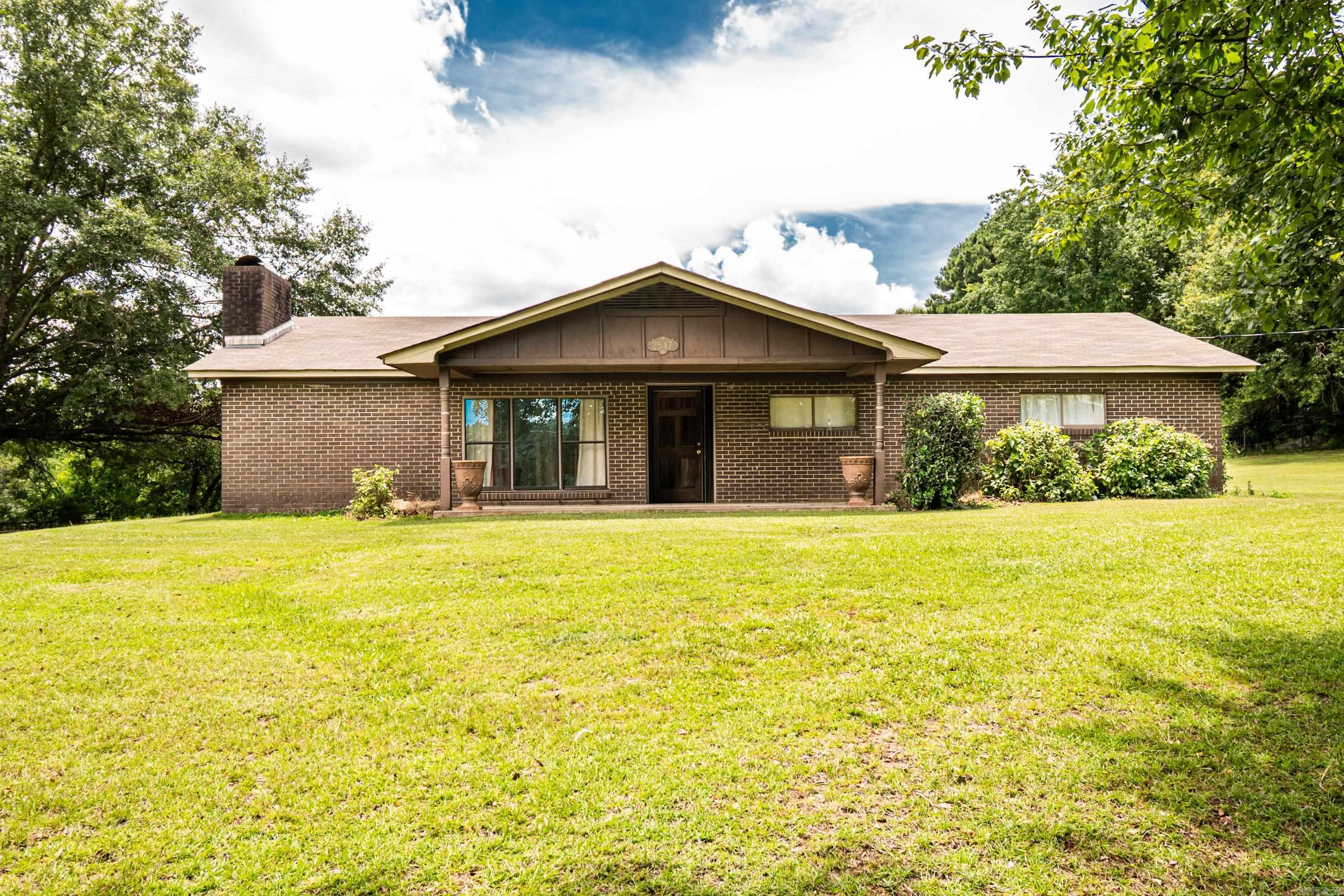 Welcome home to this beautifully updated 3-bedroom, 2-bath home nestled on just over 7 peaceful acres in a serene country setting. Freshly updated with new paint and flooring, this home offers a bright and welcoming interior, complete with stainless steel appliances in the kitchen. Whether you're looking for a quiet retreat or a place with room to roam, this property has it all. Outside, you'll find a pole barn with storage, perfect for your outdoor equipment, hobbies, or even a few farm animals. If youāve been dreaming of country living, this is the one. Come experience all the charm and space this Huttig gem has to offer!