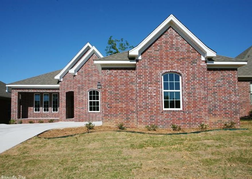 Beautiful new home with gorgeous finishes! Hardwoods and tile in living areas.  Stainless appliances with a gas range, built-in mwo and glass hood. Granite in kitchen and baths.  Master suite is separate and the bath features his/hers closets, separate vanities, huge linen closet, tile shower and Jacuzzi tub! Large laundry room with enough space for an extra fridge or freezer. Gas fireplace. Square footage approximate - encourage measuring. Taxes will be based on finished construction.