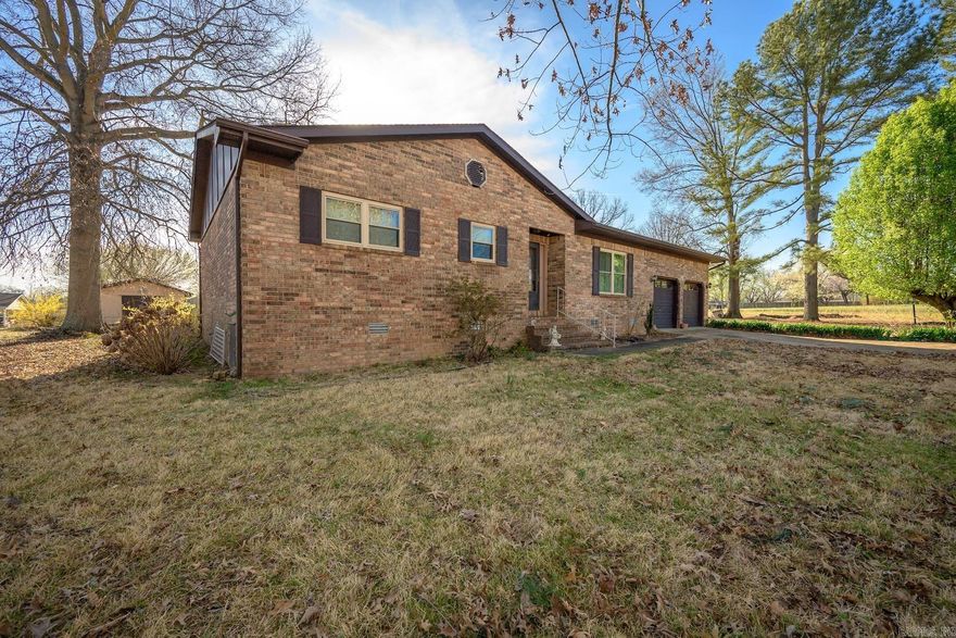 Located in the HOLLY HILLS SUBDIVISION in Batesville, Arkansas, this 3 BEDROOM, 2 BATH BRICK HOMEoffers approximately 1,585 SQ. FT. and sits on its OWN PARCEL, with an ADDITIONAL SEPARATE CORNER LOT INCLUDED AS A SECOND PARCEL. The property features a FULLY FENCED BACKYARD, an OUTDOOR STORAGE SHED, and several updates per seller including NEWER WINDOWS (within the last 3 years), NEWER HVAC, NEW WATER HEATER (2026), and a NEW COOKTOP STOVE. Seller also states the SEPTIC LINES WERE REDONE approximately 7–8 years ago. While the home does need TLC and cosmetic updates, it offers GREAT BONES and INCREDIBLE POTENTIAL. For homebuyers, this property provides AMPLE YARD SPACE and the opportunity to MAKE IT YOUR OWN. For investors, this could be a GREAT INVESTMENT OPPORTUNITY, and the EXTRA CORNER LOT creates potential for a FUTURE SINGLE-FAMILY HOME if restrictions allow. Seller is SELLING AS-IS. CALL TODAY to schedule your showing and explore the POSSIBILITIES this property has to offer!