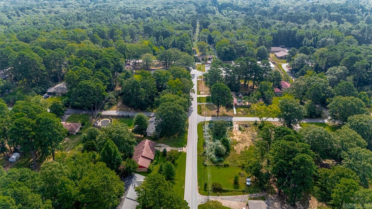 Prime In-Town Lots ā Build-Ready & Fully Fenced! Donāt miss this rare opportunity to own two spacious lots right in the heart of town! These build-ready parcels are fully fenced and feature a few beautiful mature trees for shade and character. Whether you're looking to build a home, investment property, or business opportunity (subject to zoning), the possibilities are endless. Location is everything ā and these lots are perfectly situated just steps from a shopping center. Utilities are nearby, and access is easy with paved road frontage. Take advantage of this unique chance to develop in an established area.