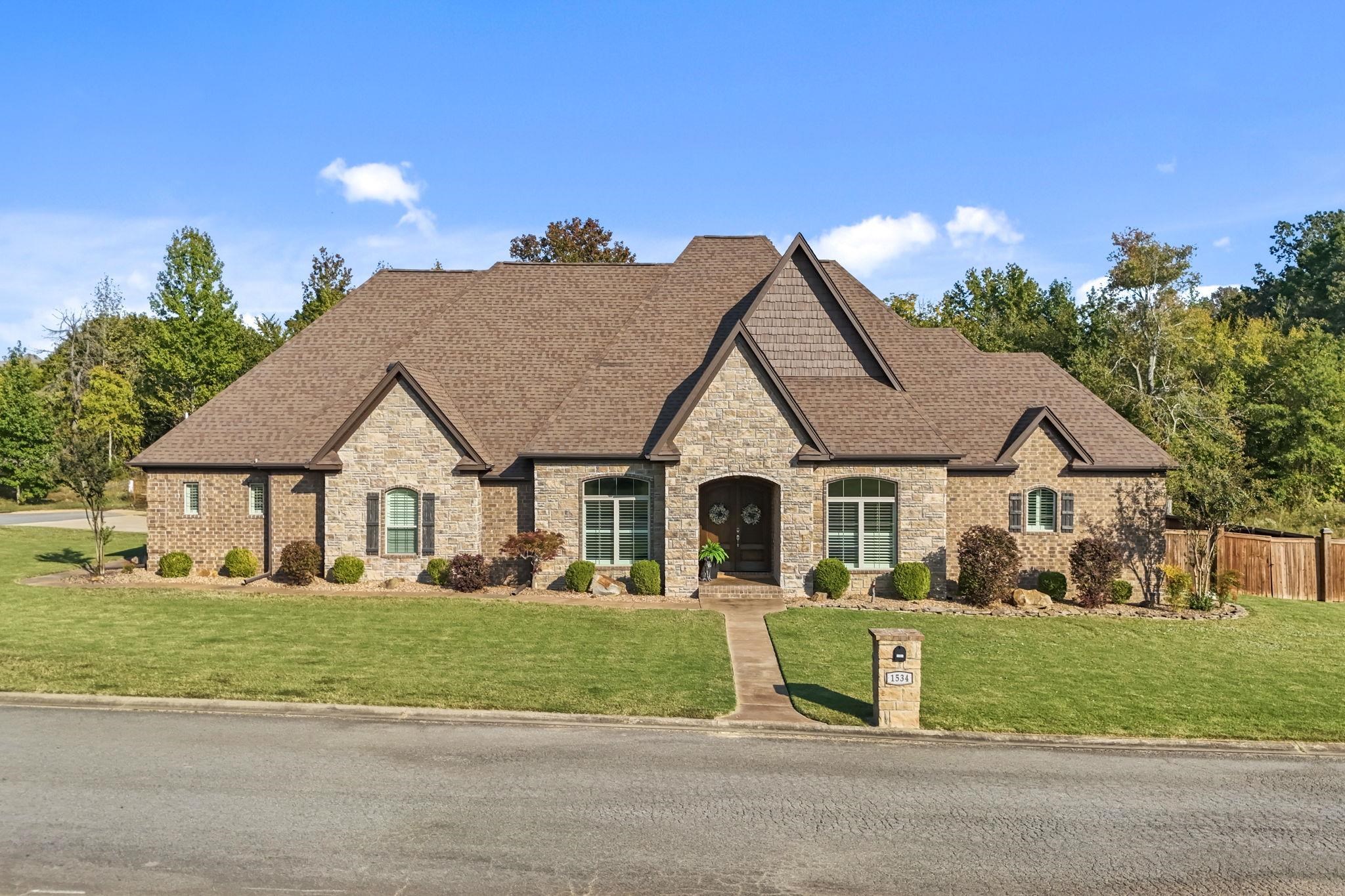 Home Sweet Home! This stunning residence offers 4 spacious bedrooms, 3 full and 2 half baths, making it perfect for families and entertaining guests.Step inside to discover luxurious details throughout, including beautiful built-ins that add character and functionality to the living spaces. Enjoy movie nights in the elegant theater room, and take advantage of the versatile bonus room that can be tailored to your lifestyle. For sports enthusiasts, enjoy your very own basketball court right in your backyard! Safety and security are paramount with a dedicated storm shelter. The gourmet kitchen is a chef's delight, featuring high-end appliances and stunning finishes, along with a private office perfect for remote work or study. Host elegant dinner parties in the formal dining room, and unwind in the screened-in patio, complete with a cozy fireplace for those chilly evenings.As a unique bonus, this home includes a hidden room, adding an element of intrigue and versatilityāperfect for a secret office, playroom, or storage! Donāt miss the opportunity to make this exceptional property your own! Agents please see remarks about theater room.