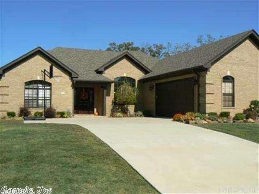 Beautiful kitchen with stained cabinetry, stainless appliances and granite countertops.  Dark hardwood flooring, tile in wet areas, very nice master bath with 4 ft shower, jetted tub and big walk in closet.  Alarm system and fenced back yard, too. No smoking and pets permitted with restrictions.