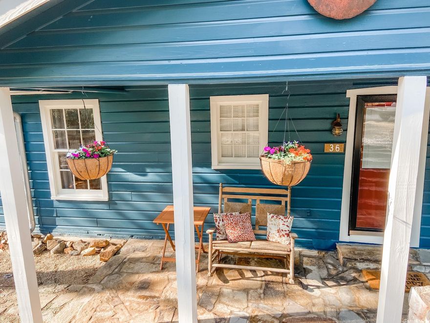 Lake Greeson? Wouldn't that be great to call home!! Gorgeous home with views that are absolutely stunning can be seen from picturesque windows from living area, formal dining, and master bedroom. Wake up with the sun rises and enjoy the sunsets. The house is fully furnished and ready to move in now. The kitchen boast great color with tile countertops and all appliances remain and that includes the stainless steel stove & refrigerator. A beautiful warm soothing color tones, wood burning fireplace, hardwood flooring, keeps you feeling cozy and comfortable. Downstairs basement area will make an additional bedroom or office with a full bath. There is a large living area, breakfast bar open to the kitchen. There is access to the waters edge either by road or stairs. There is a detached two car garage for storing boat, cars, golf carts etc. with a breeze way leading to an additional room can be used as a library with ample bookshelves, spectacular views from the picturesque windows. A boat dock, and there is a two-unit watercraft platform beside the boatdock. You have to see it all in its glory to appreciate all this beauty has to offer.