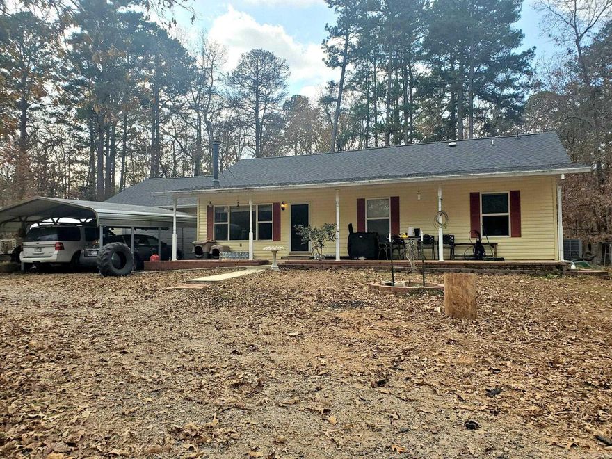 Your Perfect Country Retreat Awaits! Discover peace, privacy, and possibility with this beautiful 3-bedroom, 2-bath home on 6+ acres, perfectly set against a National Forest boundary for unmatched seclusion and scenic views.  Step inside to an inviting open-concept layout, ideal for gatherings and everyday comfort. HVAC system with a pellet stove for backup.  Enjoy the stunning 440 sq. ft. sunroom heated and cooled by a mini split system, complete with a warm cedar ceiling - your new favorite spot for relaxing year-round. This property is designed for convenience and self-sufficiency with:  Attached garage; Wiring for a whole-home generator; RV port with full 50-amp hookup; Safe room for added peace of mind.  Outdoors, the land is fully equipped for animals, projects, and storage:  Fenced and cross-fenced with holding pens & animal shelters; Shop, storage buildings, barn sheds; 3-car carport + circle driveway.  Whether you're looking for a homestead, hobby farm, or private getaway, this property has everything you need - and more.