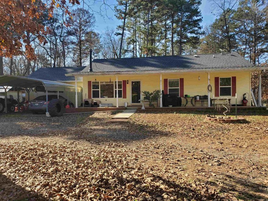 Motivated Sellers!  Your Perfect Country Retreat Awaits! Discover peace, privacy, and possibility with this beautiful 3-bedroom, 2-bath home on 6+ acres, perfectly set against a National Forest boundary.  Step inside to an inviting open-concept layout, ideal for gatherings and everyday comfort. HVAC system with a pellet stove for backup.  Enjoy the stunning 440 sq. ft. sunroom heated and cooled by a mini split system, complete with a warm cedar ceiling - your new favorite spot for relaxing year-round. Enjoy your own access to a year round creek while being close to numerous secluded swimming holes, hunting lands, and side by side trails. This property is designed for convenience and self-sufficiency with:  Attached garage; Wiring for a whole-home generator; RV port with full 50-amp hookup; Safe room for added peace of mind.  Outdoors, the land is fully equipped for animals, projects, and storage:  Fenced and cross-fenced with holding pens & animal shelters; Shop, storage buildings, barn sheds; 4-car carport + circle driveway.  Whether you're looking for a homestead, hobby farm, or private getaway, this property has everything you need - and more.