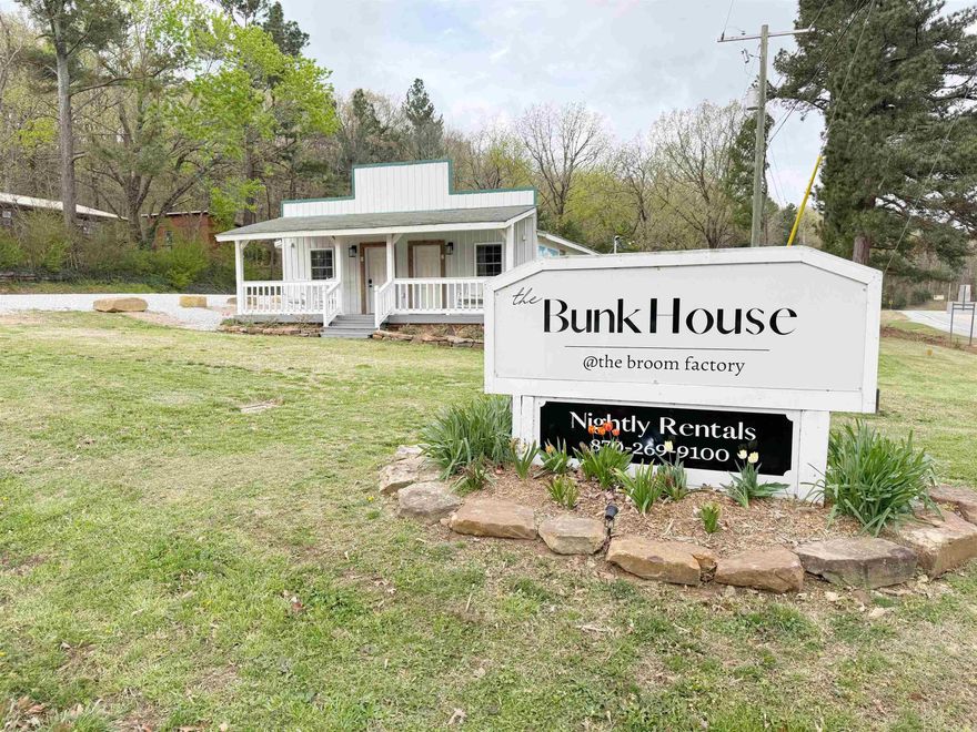 This fully furnished 4-plex has been operating as a successful nightly rental and is ready for new ownership with immediate income potential. Renovated 2.5 years ago, each suite features barn wood accent walls, custom trim, and its own fully stocked kitchenette. The property includes one King suite, one Queen suite, and two Double Queen suites. There's also a sofa sleeper and two additional fold-out beds for added guest capacity.  Each unit is equipped with a brand new Mitsubishi split unit and a Navien tankless water heater. Two washers and dryers make for quick and efficient turnovers. The business has a solid reputation, with repeat guests and strong local referrals. Conveniently located just down the road from the Ozark Folk Center and minutes from historic downtown Mountain View.