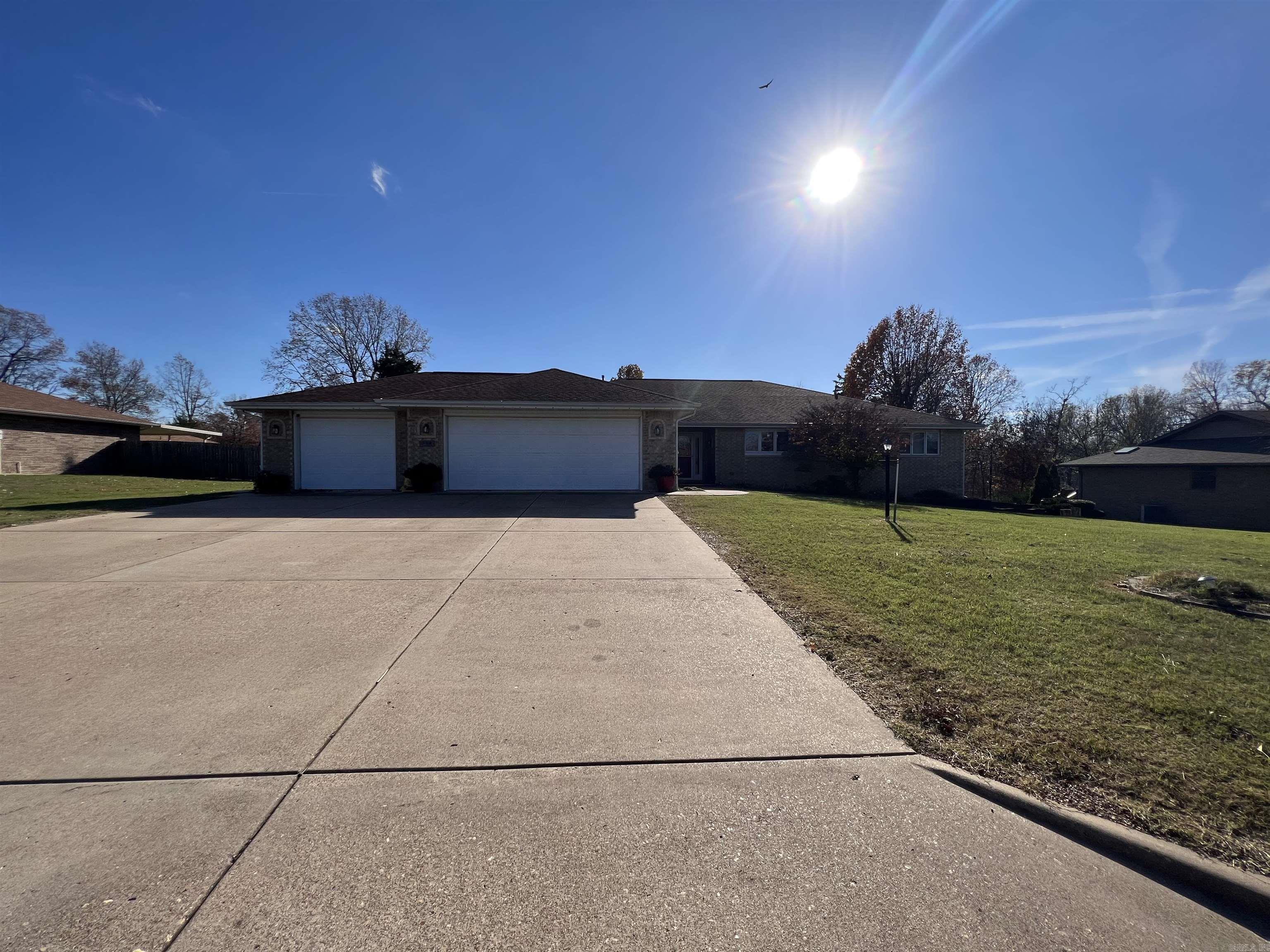 Highly desirable Northpointe Subdivision, close to NORFOLK LAKE! Meticulously maintained 3 bedroom 3 bath home! It has so much to offer including approx 2253 sq ft of open concept design, gas fireplace, beautiful kitchen/granite countertops, pantry closet, and a beautiful bay window! There are TWO primary bedrooms with EN-SUITES with sliders to the sunroom. This home has beautiful hardwood and tiled floors. Enjoy spending time in the SUNROOM with an abundance of natural light, and it also has a wood burning stove. The large fenced in back yard is an OASIS! There's an abundance of flowers, garden spots, raised garden beds, and beautiful flowering trees! The covered patio has an outdoor kitchen and is a great place to unwind and enjoy the outdoors. There's also a pergola, and a water feature! In addition this home has a WHOLE house GENERATOR, tray ceilings, sky lights, water purifier system (kitchen), and a water softener! The 3 car garage has an EXTRA HOBBY room! Roof replaced 2016 and air conditioner (2017). Live the GOOD LIFE in the beautiful Ozark Mountains! Located just outside city limits close to local businesses , and medical services. There's a lot here waiting for YOU!