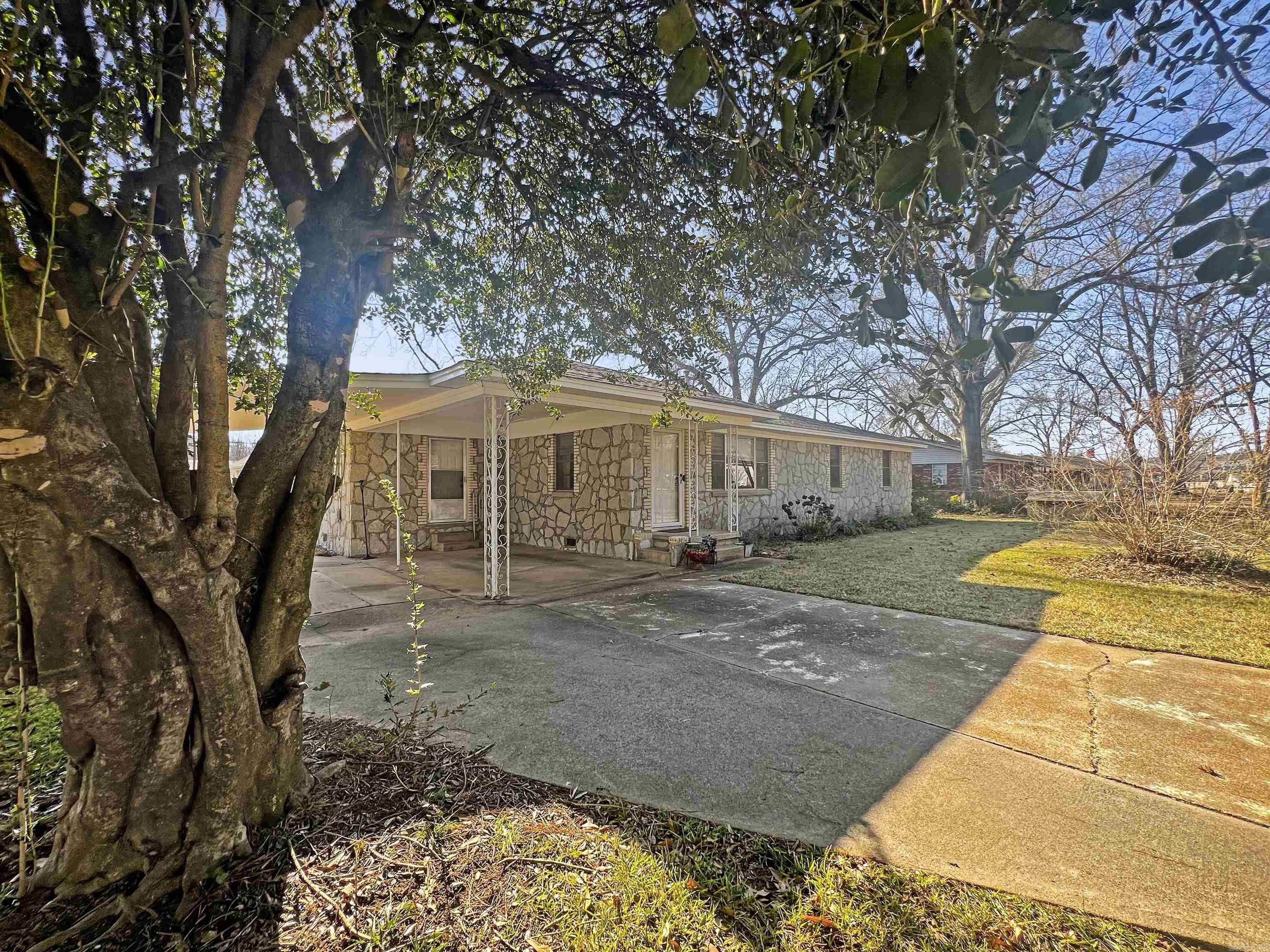 Welcome to this delightful 3BR/2BA gem nestled in a sweet neighborhood in Searcy, Arkansas! This move-in ready home offers the perfect blend of comfort and affordability, making it an ideal choice for investors and first time home buyers! Step inside and enjoy the original hardwood floors, new paint throughout, and cozy concept with living spaces that offer plenty of natural light.  The kitchens boasts a stove, dishwasher, and refrigerator with ample counter space and a breakfast bar perfect for enjoying your morning coffee! The primary bedroom has its own bathroom for added privacy while the two additional bedrooms are generously sized and share a convenient second bathroom. Outside the back yard is perfect for gathering with a new privacy fence that surrounds a covered patio with an outdoor firepit/grill to relax under the stars!  Located minutes from local schools, parks, and shopping; this home offers the charm of small-town living with the conveniences you need.  Don't miss the opportunity to make this house your home!  Agents see remarks.