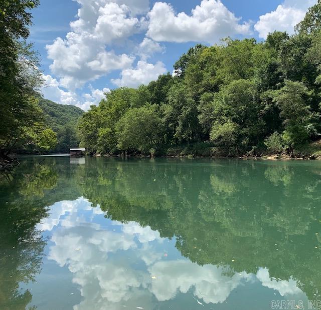 WOW, Is your dream to have land on the Little Red River? Can you imagine a home built on the bluffs overlooking the River where you can trout fish from your privately owned 1000 FT River frontage and have a place to hike, camp, build a Tree house, Repel or Zip-line. If so, you will want to schedule your showing TODAY to see this BEAUTIFUL, RARE piece of property with trees, rock formations, bluffs, waterfalls and so much more! This listing includes all Tracts (1-4) They are also in the MLS as separate listings. Agents see remarks.
