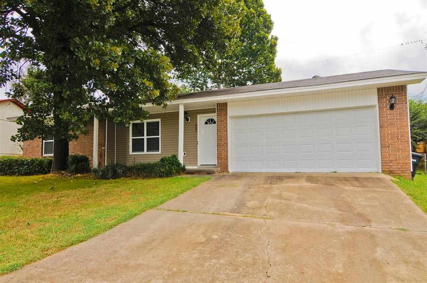 This adorable home has character and class! Not only does it have great curb appeal but once you walk in you will be just as pleased. The tile entry way leads to a large great room with a cozy corner fireplace. To your left you will find the dining area and kitchen and love all the natural light. To the right of the living room will take you to the 3 generous sized bedrooms and hall bath. The roof, windows, and siding were new in 2010, Tile in 2009, and A/C in 2008 and was just painted. Come see today!