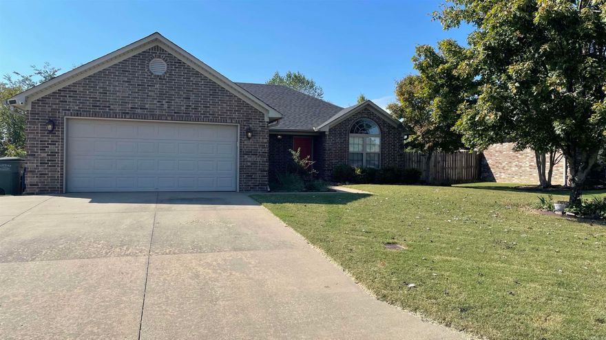 Great starter home.  Kitchen has custom cabinets and stainless steel appliances.  Also, beautiful granite counter tops and backsplash.  The backyard has an adorable covered patio and rock wall flower bed.  New roof 2025.  Newer hot water tank.  Garage has a built in work area.  Walking distance to schools and shopping.  Softball fields are super close too.