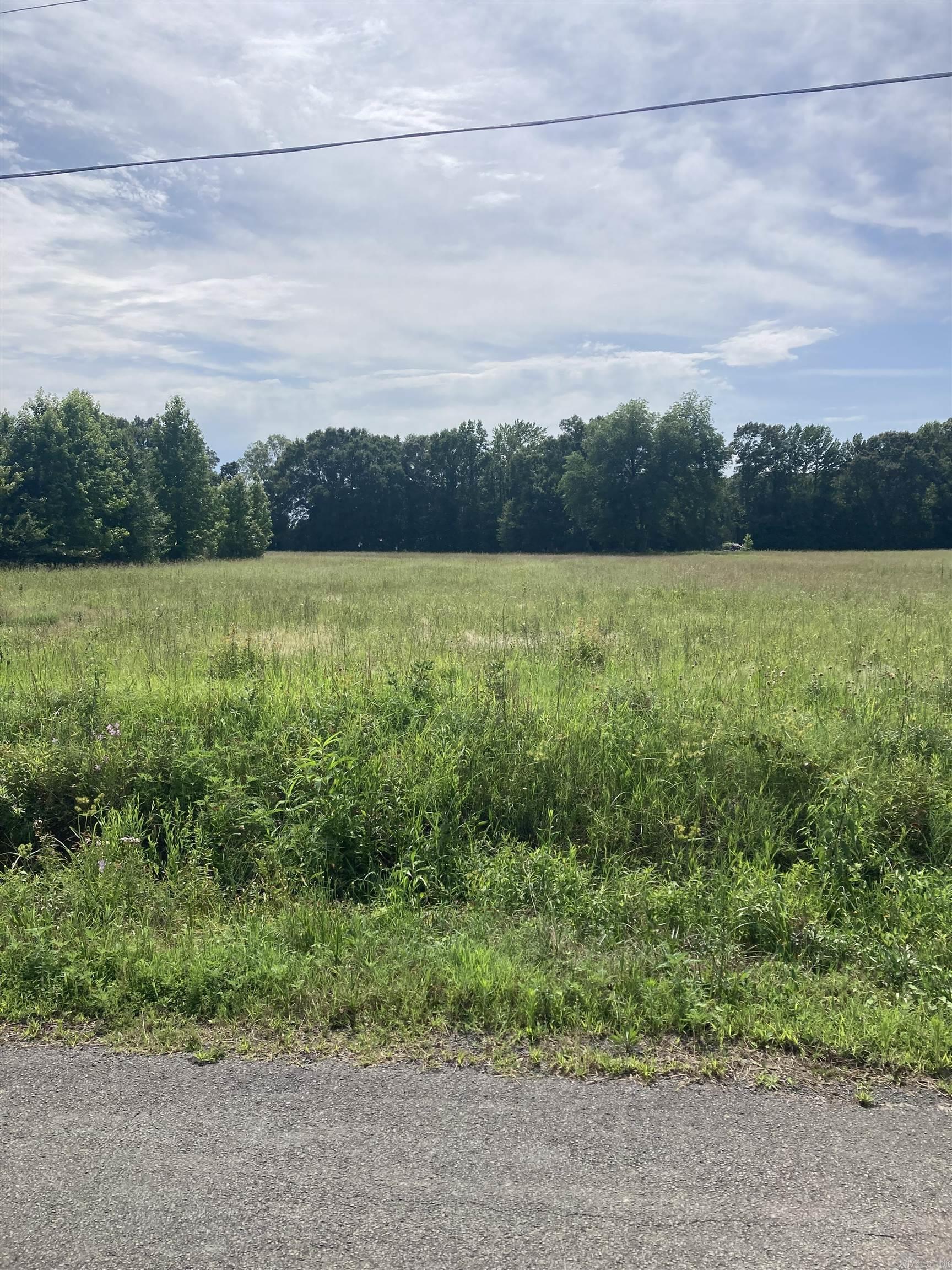Beautiful 6 acres sitting just outside of Ward city limits. Two driveways have been installed and city water is onsite. The only thing missing is you and your dream home. No restrictions. Call now to schedule a showing.
