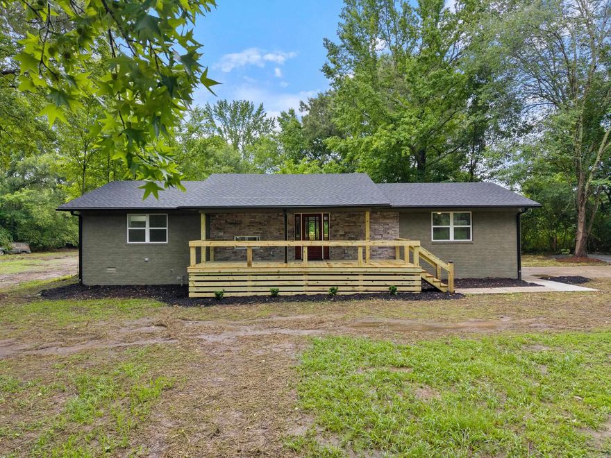 Absolutely stunning remodeled home on 1.37 acres in Wooster. Luxury vinyl floors throughout with an open floor plan that has plenty of space for family and guests. The beautiful kitchen with granite countertops and custom backsplash also features a large walk-in pantry. The primary ensuite is separate from the other bedrooms. Primary bathroom boasts two sinks and custom tile shower. Walk-in closet. Two other guest bedrooms on the main level. There's also a second storage area on the first floor with cubby for even more storage. Downstairs you'll find the 4th bedroom, which could also be used as a bonus/media room or office. As great as the remodeled interior is, the outside is just as enticing. Two large all new wood decks, one on the front one out back, make this home perfect for outdoor entertaining. There's also a koi pond with bridge and fountain in the park-like back yard that leads to a fire pit area. This is a great location. Inside Wooster city limits, but has a country feel. Only 4 minutes to Dollar General and Wooster Elementary. 6 minutes to Greenbrier High School. 10 minutes to I-40. 15 minutes to downtown Conway.