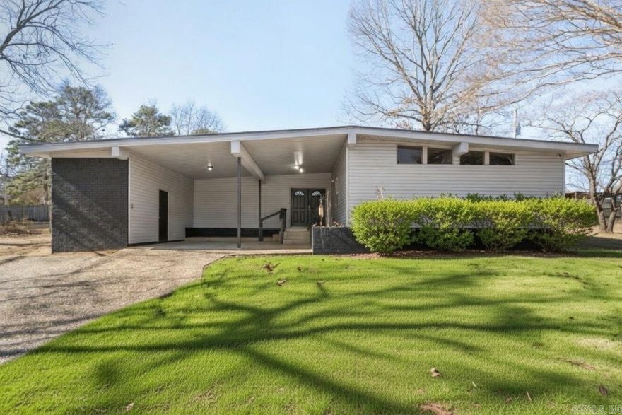 Discover timeless Mid-Century Modern charm in this must-see 4-bedroom, 2-bath home with 2,040 sq ft of stylish, functional space!  Nestled on a quiet cul-de-sac, enjoy prime location minutes from shopping, dining, schools, and daily conveniences—ideal for easy, low-stress living. Enter an inviting open-concept layout perfect for entertaining or daily life, with room for a cozy breakfast nook, formal dining, and abundant natural light. Warm up by the charming wood-burning fireplace on cool evenings. The primary bedroom is a serene retreat with en-suite bath. Three versatile bedrooms adapt easily as guest rooms, home office, gym, or flex spaces to fit your needs.  The highlight: a fabulous screened-in porch you’ll love year-round—featuring electric patio heaters for comfort and a drop-down projector for movie nights under the stars!  Enjoy the spacious backyard with fresh fencing for pets/play/relaxation, plus covered patio for parking, projects, or storage. Brand-new metal roof ensures durability and low maintenance. Bonus: premium reverse osmosis water filtration system for pure, crisp water.  This move-in-ready gem blends retro appeal with modern updates in a great spot!