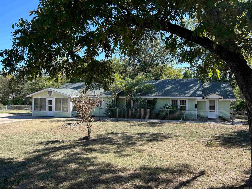 This multifamily property offers instant income with 2 fully occupied units. The duplex offers a combined total of 2688 sq ft with 8 bedrooms and 4 bathrooms, making it an ideal setting for substantial rental income. Located in the heart of Hot Springs and within walking distance to Oaklawn Racing & Casino. Currently, one-year leases secure a monthly income of $3,100. The duplex sits on a spacious corner lot and comes with an additional fenced lot, offering ample space for parking and outdoor entertainment. Both units are in good repair with a newer roof and offer new floors, updated kitchens and bathrooms, updated electrical, and efficient new window air conditioning units and new gas wall heaters. The larger unit features 5 bedrooms and 2 bathrooms, while the cozier unit offers 3 bedrooms and 2 bathrooms. Please note, showings are by appointment only and must be scheduled at least 24 hours in advance. Please respect the privacy of the current residents by not visiting the property unannounced. If you're looking to expand your investment portfolio or step into the landlord game, this duplex promises a blend of steady income and growth potential. Contact agent for more information.
