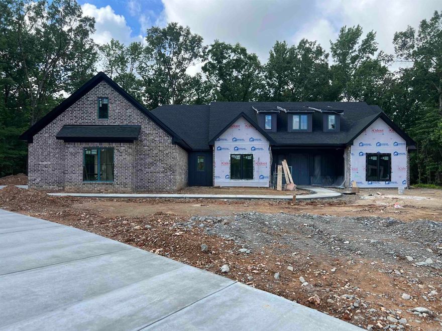 Beautiful new construction in one of Saline Counties newest neighborhoods Avilla Manor.  This home sits off of a 1/2 cul-da-sac on 1.15 acres with plenty of room to stretch out, this home boast some wonderful features such as wide open floor plan, with big sliding glass door to go out to the back porch.  Custom cabinets, with built-ins.  The primary bath is made for a queen with a open air shower and a closet that is to die for..  This home has it all set up your appointment today.