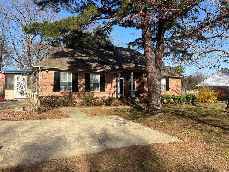 Private Yet Close to Town. This  3-bedroom, 2-bath home featuring 1,822 sq. ft. of living space, built in 2002. Enjoy a large family room, a separate kitchen, and a dedicated laundry area with cabinets. The garage has been converted into an additional bedroom but still retains the garage door, allowing for an easy conversion back if desired. A unique upper-level space above the garage offers endless possibilities—perfect for a home office, studio, or extra storage. Outside, you’ll love the fenced backyard, shop, and screened-in gazebo—ideal for entertaining. Plus, a brand-new roof (2023) adds extra peace of mind. Call to view this home. Agents please see remarks.