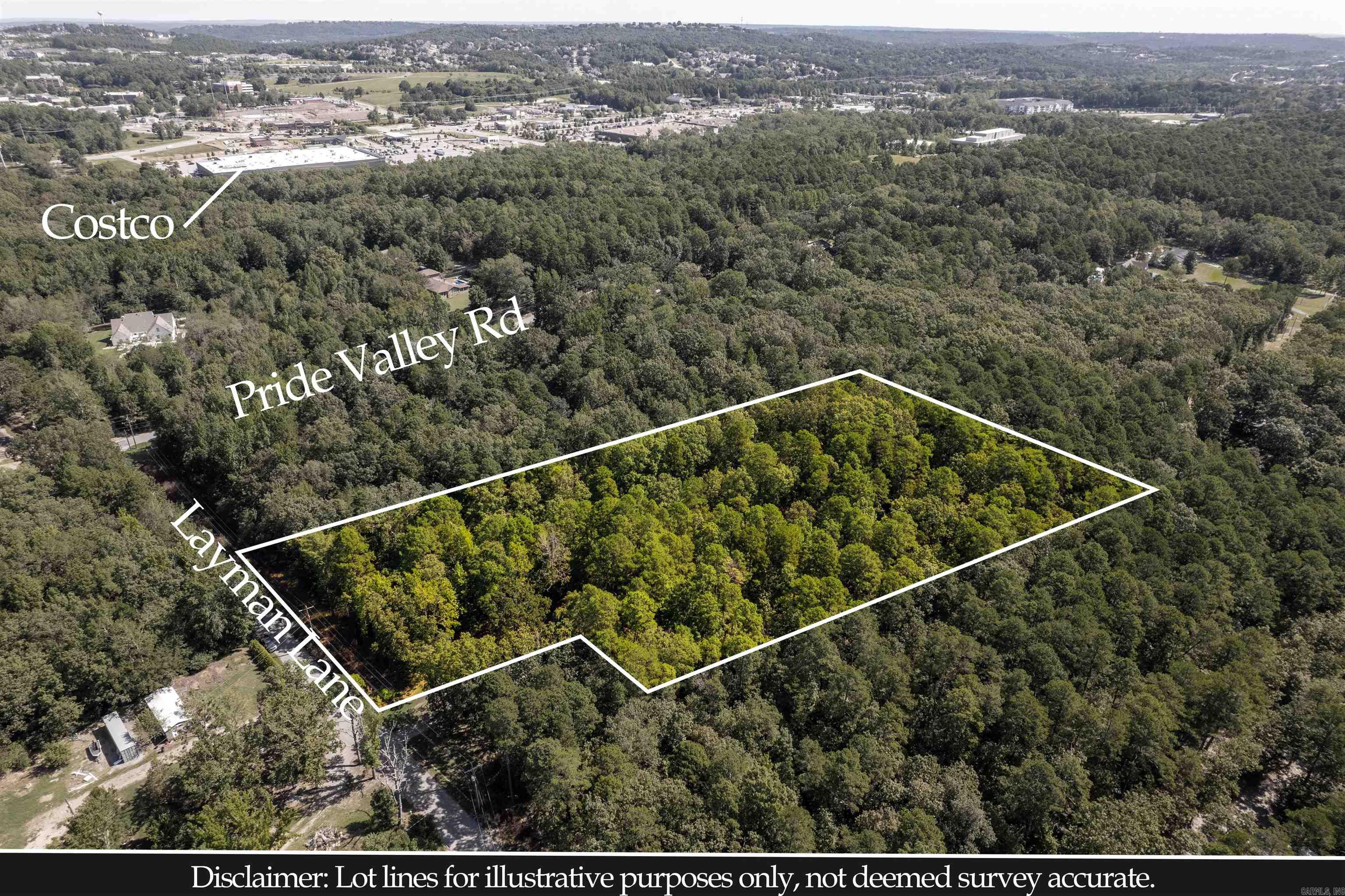 Make your mark in West Little Rock! Over 4.5 acres of wooded land with beautiful large trees and small rolling hills. Convenient to fine dining and shopping while being secluded in a quiet area. Inside city limits to build your dream home, or enough land to subdivide for a small development. Buyer to do their own due diligence for utilities. Acreage approx., measurement encouraged.