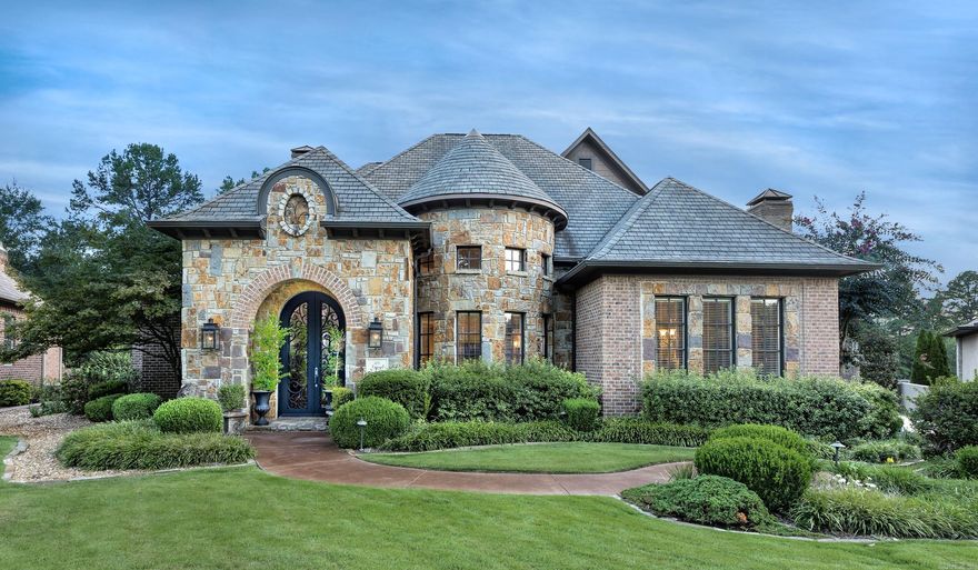 This stunning home is designed for both entertaining and effortless living. A spectacular two-story entry opens into the formal living room, where walls of windows overlook a gorgeous in-ground pool, tranquil water feature, outdoor fireplace, and a large covered patio. The private, level backyard creates the perfect backdrop for gatherings of any size.  The spacious den connects seamlessly to the eat-in kitchen, featuring two pantries, a Viking 6-burner cooktop, wall ovens, a cozy fireplace, bar, icemaker, and wine refrigerator—everything needed for cooking and entertaining in style.  On the main level, you’ll find the luxurious primary suite, a guest bedroom, home office, formal living and dining rooms, 2.5 baths, and a full laundry. Upstairs offers even more space with a media room, additional bedroom, and full bath.  Located in The Arbors, a gated neighborhood where all lawn maintenance is included, this home offers convenience as well as beauty. With easy access to the country club and all the amenities of Chenal Valley, this property combines privacy, elegance, and lifestyle in one remarkable package.