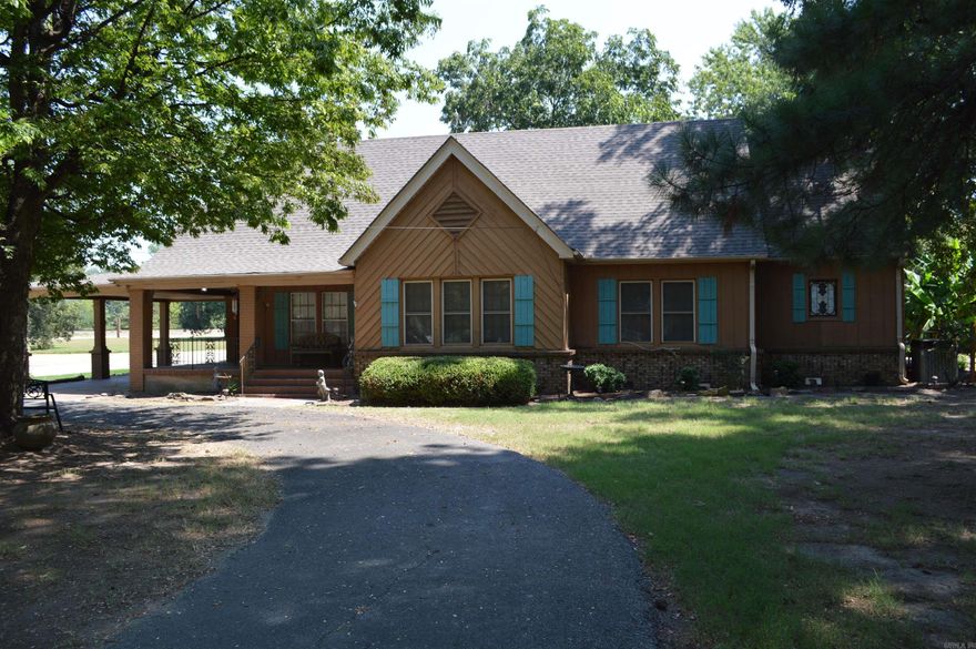 This beautiful landscaped home is located in the heart of Harrisburg. With 2,482 sq. ft. of living space on a 1.21 acre lot this home has a large family room, office space, living room, dining room, spacious kitchen, large bedrooms and bathrooms. The attached garage has a second level for storage. Need a work shop? It's got that too, being 30'X4 40' with electric and concrete floor.  Call today to make an appointment to see this home. This property would also make a perfect duck hunting lodge.