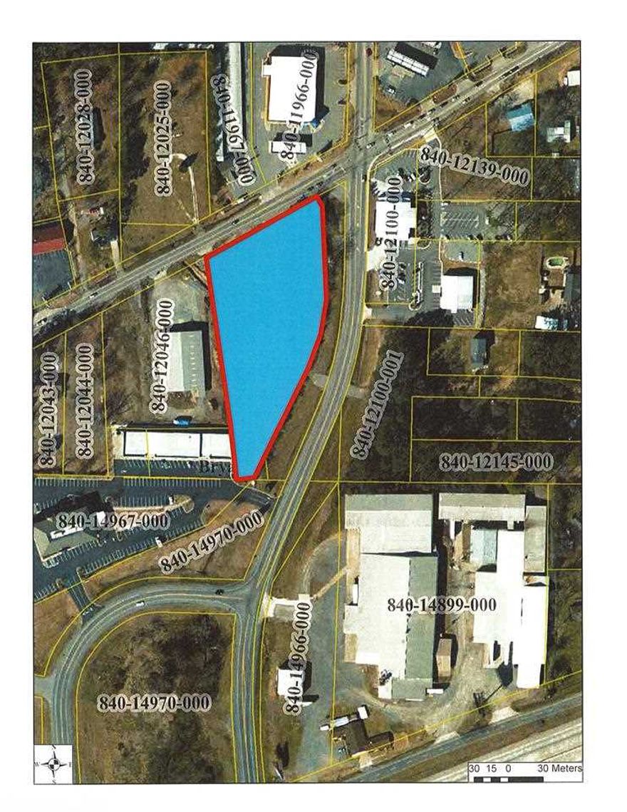Great Commercial Property !!! Approximately 2.58 acres in growth area and located on a major corner of Hwy 5 and Springhill Road, property fronts Hwy 5 and Springhill Road Overpass and on opposite corner of U S Pizza and across the street from Baxley Penfield Moudy Realtors offices. Owner will consider subdividing the tract into two parcels.