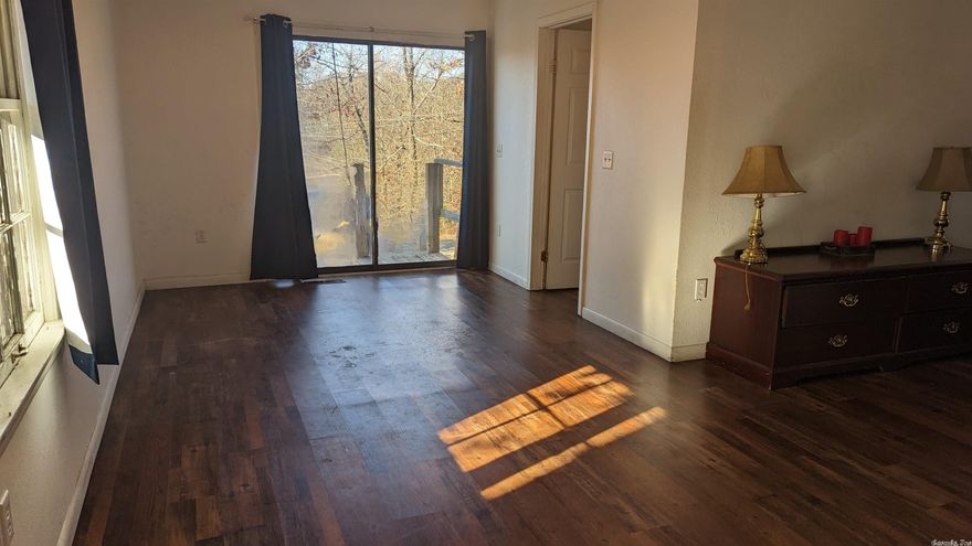 Avail November 1st. 2 bedroom home with 1 and 3/4 bath. New paint and vinyl flooring throughout.  Large living room. Corner lot on 2 quiet streets. Close to South Fork of the Spring River and North Golf Course. Not far from town center. Includes shed and fenced in area with dog house! Will have new roof this month. Propane heat, water heater & cook stove.   Renter's/Liab Insurance Required. Pest control is $20 per month in addition to rent, a quarterly service.