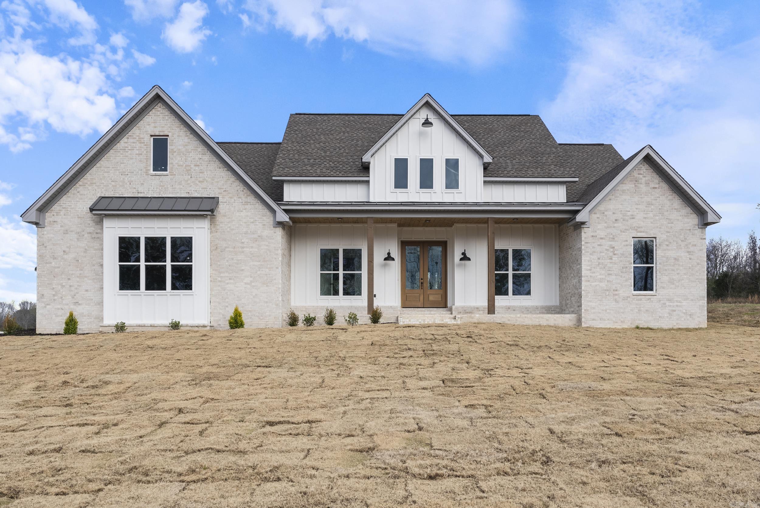 Step into this gorgeous 4 bed 2.5 bath home in Ashley's Place Subdivision. This farm house style home features beautiful granite countertops in the kitchen, with quartz throughout the rest of the home. It has custom cabinets,   a tile master shower, gas fireplace in the living room, butlers pantry and LVP flooring throughout on a spacious .99 acre lot. Set out on your covered back porch and watch the sun set on the coming summer nights.