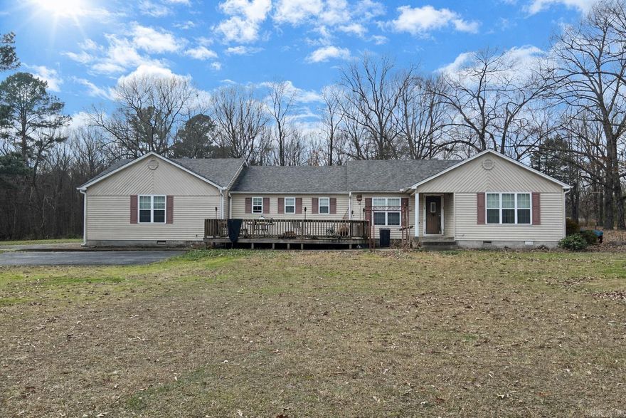 This country home has unlimited possibility! If you have the vision to turn a country home with lots of space into your dream home look no further. This home sits on 2.24 useable acres AND has a tiny home on the property that boasts its own living room, kitchen, laundry area and bedroom. Perfect for a mother-in-law quarters  The main home has a large living room with hardwood floors, eat in kitchen and a separate dining room. Lots of storage a laundry room plus and a huge front deck for entertaining. 2 Car garage with extra storage room Home is AS-IS-WHERE-IS Measuring Encouraged