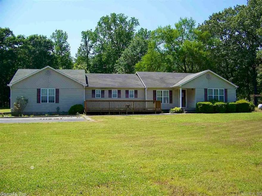 This country home has unlimited possibility! If you have the vision to turn a country home with lots of space into your dream home look no further. This home sits on 2.24 useable acres AND has a tiny home on the property that boasts its own living room, kitchen, laundry area and bedroom. Perfect for a mother-in-law quarters  The main home has a large living room with hardwood floors, eat in kitchen and a separate dining room. Lots of storage a laundry room plus and a huge front deck for entertaining. 2 Car garage with extra storage room. Measuring Encouraged