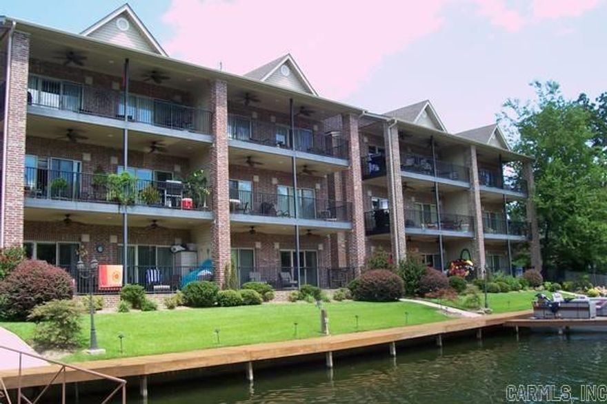 Luxury Condo on Lake Hamilton!  Walk in unit! Boat Slip is optional for $100/mo. Beautiful Brazilian Hardwood Floors! SS Fridge, Microwave, Stove, DW & separate ice-maker. Tall ceilings with crown molding throughout! Master BR & Living Room open to 32' covered patio just 25' from lake! Quite Cove real close to shopping and restaurants and just minutes form Bypass & Oaklawn! Granite counters! Washer & Dryer!  open floor plan. Energy efficient! Deposit is also $1275. Will also sell condo with or w/o boat slip