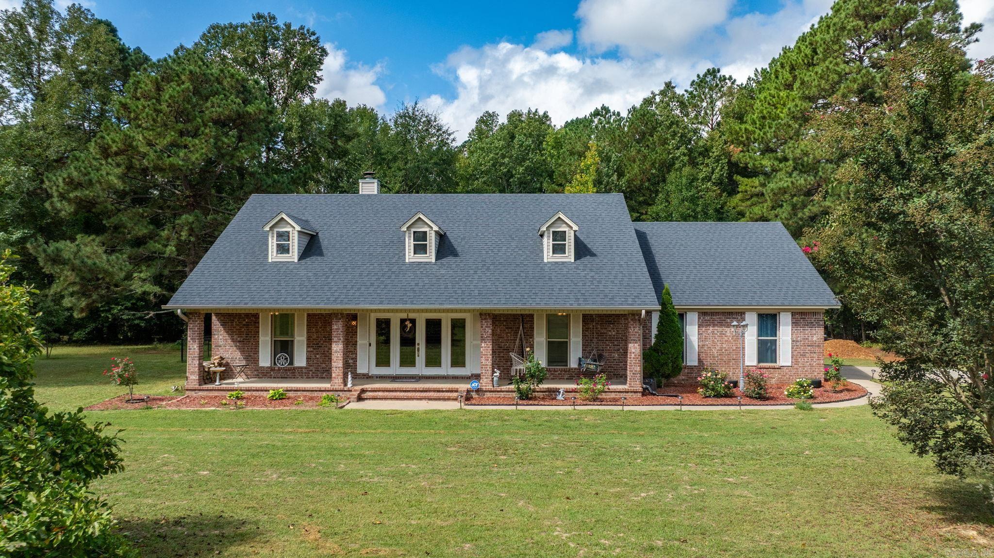 Discover your dream home with this stunning new listing! Nestled on 1.46 acres of serene landscape, this spacious 2097sqft property boasts four bedrooms and two bathrooms, perfect for comfortable living. The home features a beautiful kitchen with a charming copper farmhouse sink, adding a touch of elegance and warmth to your culinary space. Enjoy endless fun with the above-ground pool, ideal for relaxation and entertaining guests. Additionally, the property includes a handy 16x24' storage building, providing ample space for all your needs. Safety and peace of mind are prioritized with a storm shelter conveniently located under the garage. Don't miss out on this exceptional opportunity to own a perfect blend of comfort and functionality. Agents see remarks for all updates.