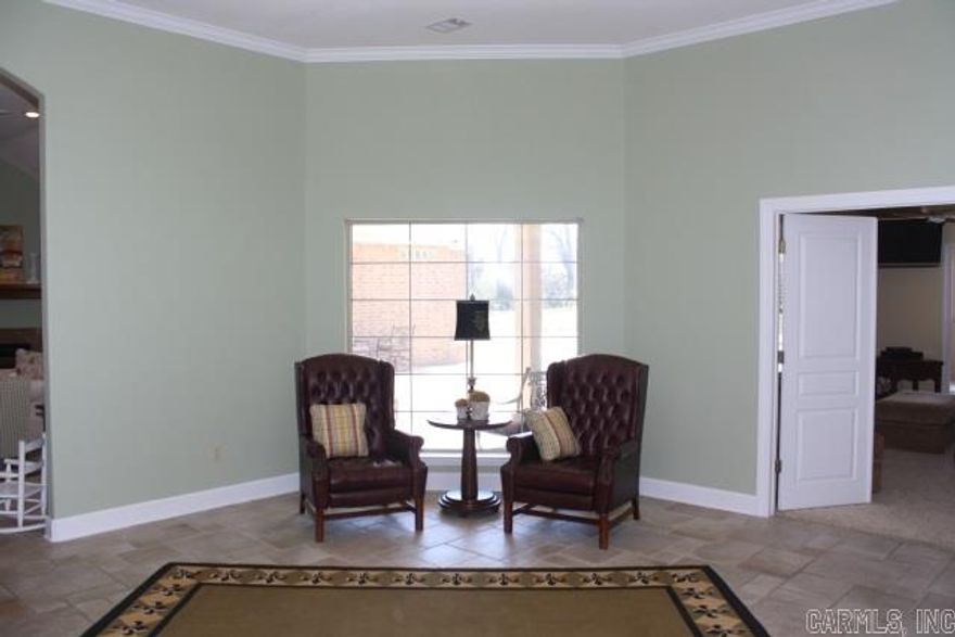 You’ll be speechless from the moment you walk thru the double entry doors into the foyer w/ views of patio courtyard, in-ground POOL & outdoor kitchen. Unobstructed living room & kitchen space w/ huge, granite topped island. Master suite has separate dressing room & the 2nd of 2 fireplaces . Bath has twin vanities, jetted tub & walk-in shower.  SAFEROOM.  On the guest wing are 3 bedrooms & 2 baths plus a family room. 26 x 40 pool/guest house w/ bath & full kitchen. Granite tops. 4 car garage. (see remarks)