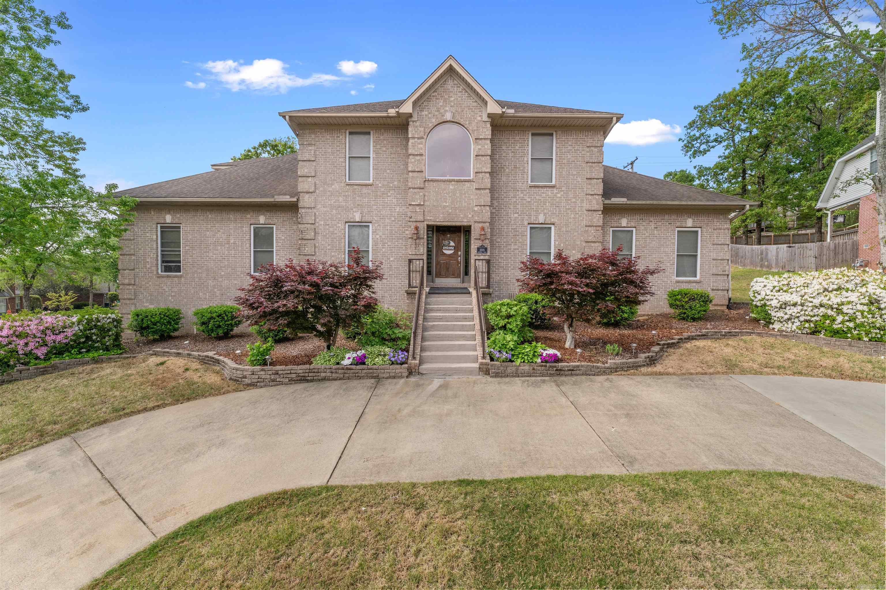 Wow - custom built gorgeous brick corner-lot Overbrook home! Street appeal galore: lovely landscaping. Site-laid real hardwood floors adorn very open floor plan designed w/family living and entertaining in mind. Half bath downstairs for guests. Kitchen has quartz countertops, pantry, 2 ovens, icemaker, sit-down bar. Master suite downstairs w/huge master bath and His & Her's walk-in closets. Upstairs boasts 3 very nice sized bedrooms, 2 full bathrooms & fantastic bonus room! Laundry is over the top! Covered back deck affords delightful place to relax and entertain. Amenities galore: sprinkler system, gutters & 3 car garage. New roof 2021. New 75-gallon water heater 2022. HVAC system 2012. Kitchen / baths renovated in 2017. Kitchen appliances replaced 2020 / 2021. Home has been impeccably maintained. See agent remarks.