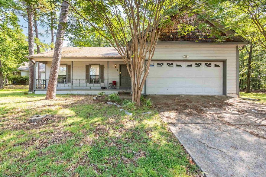 Welcome to 1 Pin Oak Loop in Maumelle. This .34-acre shaded lot is an inviting setting for a traditional three-bedroom, two-bath single-family home. The home is clean and ready for the next buyer. Upon entering the house, a large living room and kitchen/dining area offer space to enjoy winding down in the evenings. All three bedrooms are on one side of the property, with two bathrooms, including one off the primary bedroom. The 2-car garage is good-sized, and the backyard is a quiet space for outdoor living. Some cosmetic updates are in order, but the property is of good value in Maumelle. Enjoy an easy commute into Little Rock with multiple highway access points a short drive away.