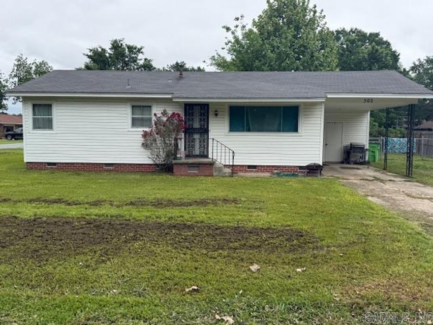 Great starter home located walking distance to the elementary school. Corner lot with chain link back yard for your pets. 2 bedrooms with a bonus room in addition to the living area. Central heat and air. Bedrooms have hardwood floors.  Give us a call for a showing.