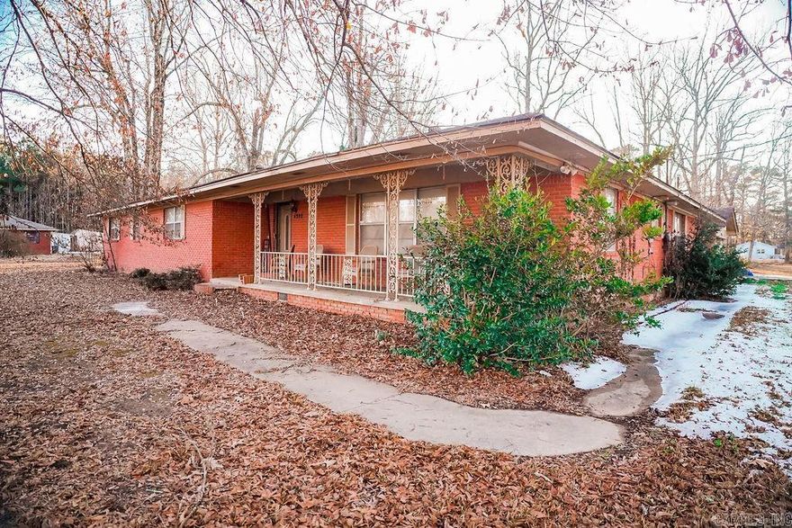 Investor special with great potential! This 4-bed, 2-bath home sits on right under 2 acres in Pine Bluff and features a classic layout ready for your vision. Spacious lot, flexible floor plan, and ideal for a rental or flip. Priced to sell—don’t miss this opportunity!