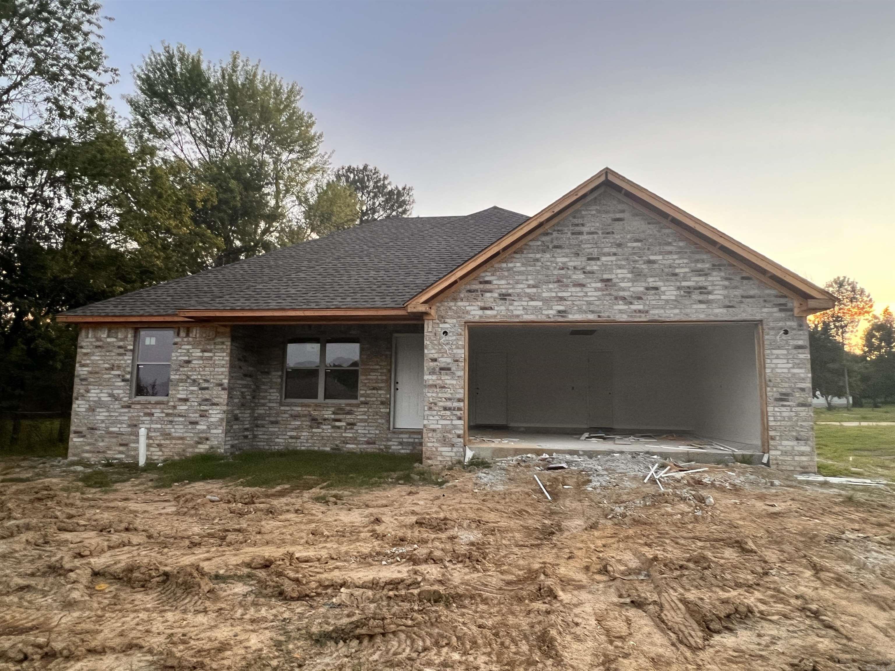 New construction inside city limits!!! Property has the convenience of living close to town. Laundry room is conveniently located right off the 2-car garage. The kitchen will have granite countertops, and luxury vinyl plank flooring will be throughout the house. The kitchen/dining room combo shares a 9-ft ceiling with the living room. A huge picture window in the living room enhances the "open feel" of the shared space. Master bedroom contains a spacious walk-in closet alongside your private bathroom. The split floor plan adds a feeling of privacy to the master bedroom as well. Still under construction, but soon to be completed!
