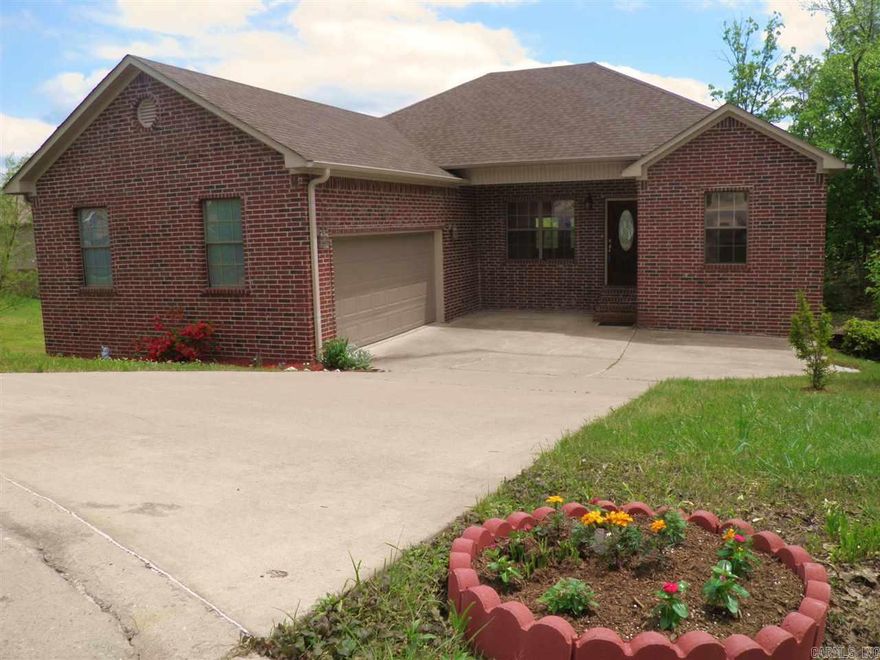 Great space buy in scenic area.  2014 updates include new AC unit, paint and carpet.  Bonus room/5th bedroom down is great teen/in-law quarters with full bath, built ins and French doors to lower deck.  High ceilings on both levels and an open layout. Play set conveys. Lawn is prewired for electronic fence.  A must see...like new! See showing remarks