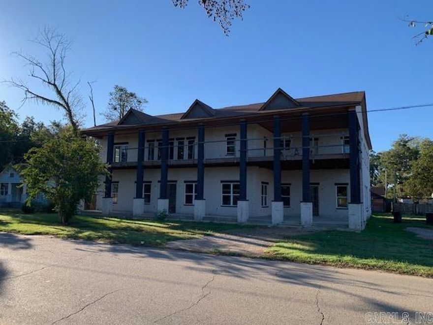 Luxury vision awaits!!! Over 10,000 sq feet, new partially completed construction and a private master balcony. situated on over half an acre in the heart of Marianna , near the historic Languille, St. Francis, and Mississippi Rivers, with access to Bear Creek Lake Recreational area. The property also includes two additional housing units for potential rental income. A rare opportunity to create a custom masterpiece in an idyllic setting. Motivated seller.